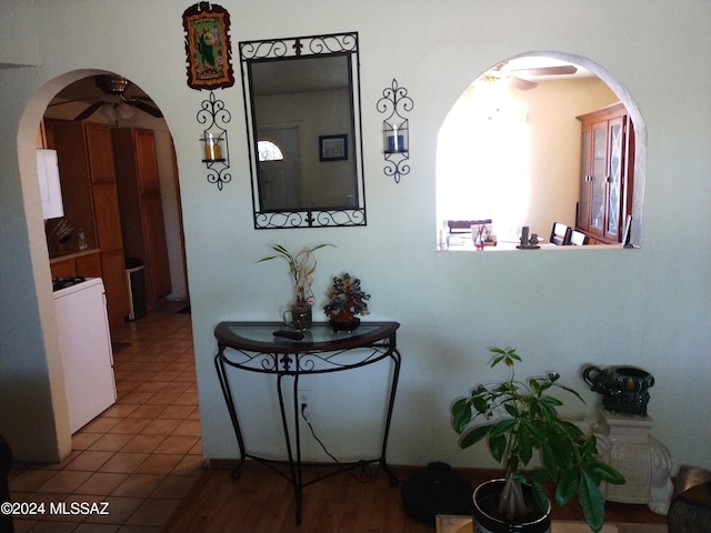 hall with tile patterned flooring