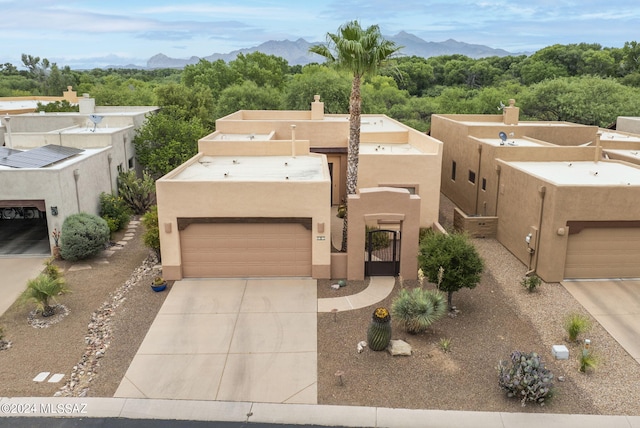 adobe home with a mountain view