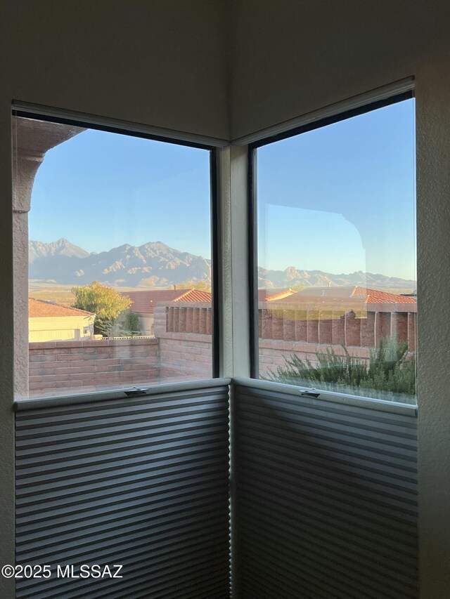 view of side of property with a mountain view