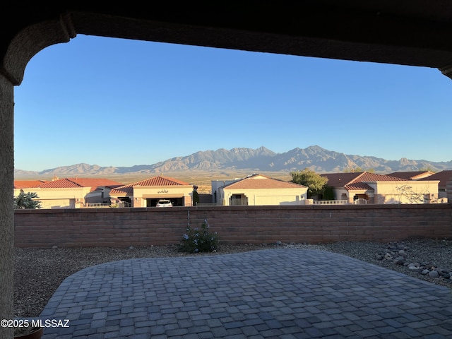 view of patio with a mountain view