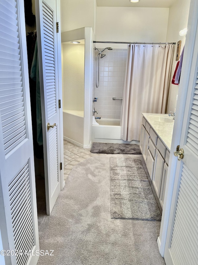 bathroom with vanity and shower / tub combo