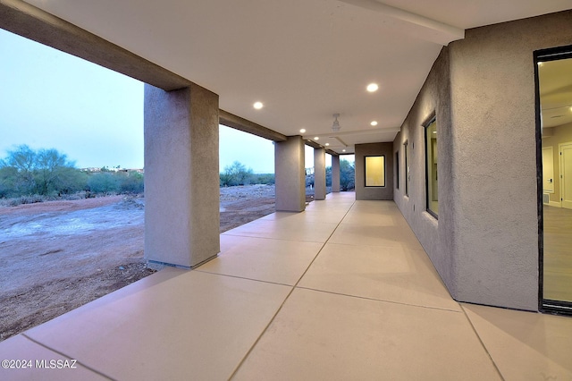 view of patio terrace at dusk