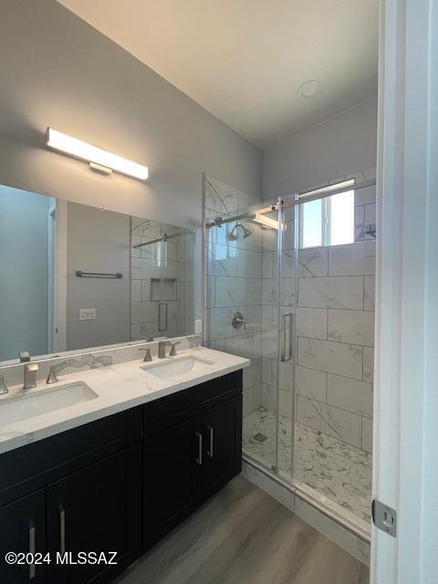 unfurnished bedroom with a closet, baseboards, dark wood-type flooring, and recessed lighting