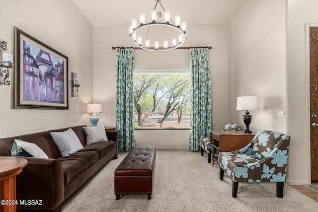 carpeted living room with a notable chandelier