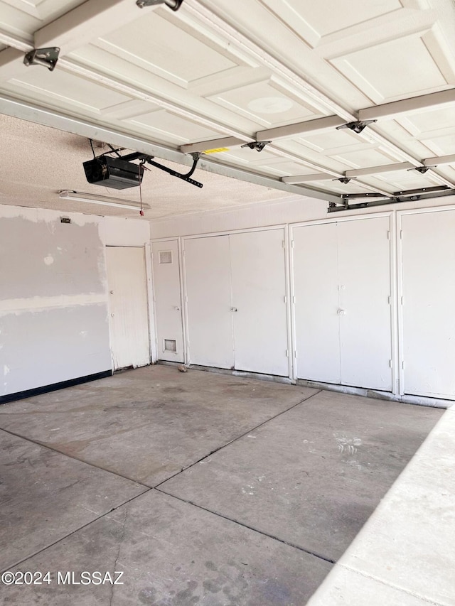 garage featuring a garage door opener