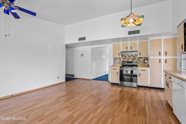 kitchen with decorative backsplash, white dishwasher, ceiling fan, hanging light fixtures, and stainless steel electric range