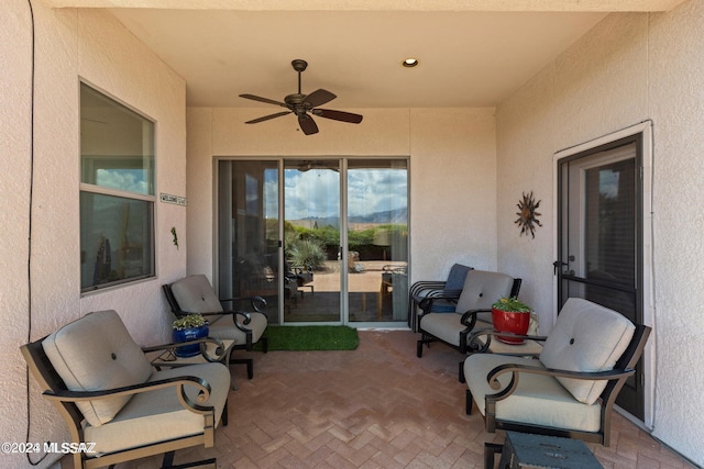 view of patio featuring ceiling fan