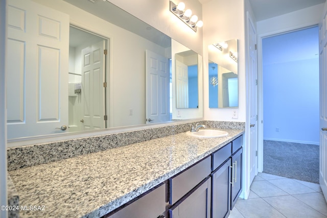 bathroom with vanity and tile patterned floors