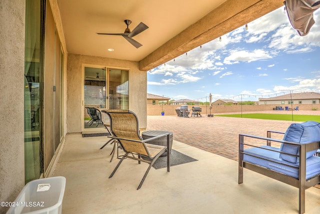 view of patio with ceiling fan