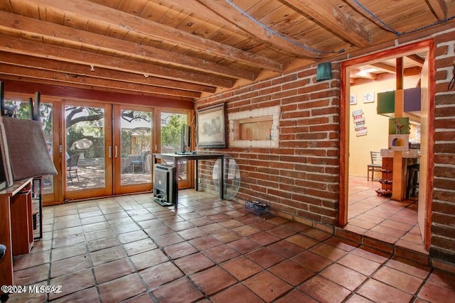 interior space featuring wood ceiling, beamed ceiling, and french doors