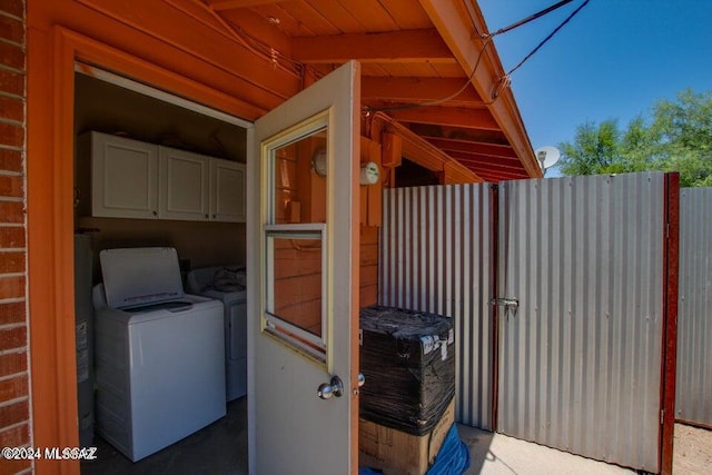 exterior space featuring washing machine and dryer