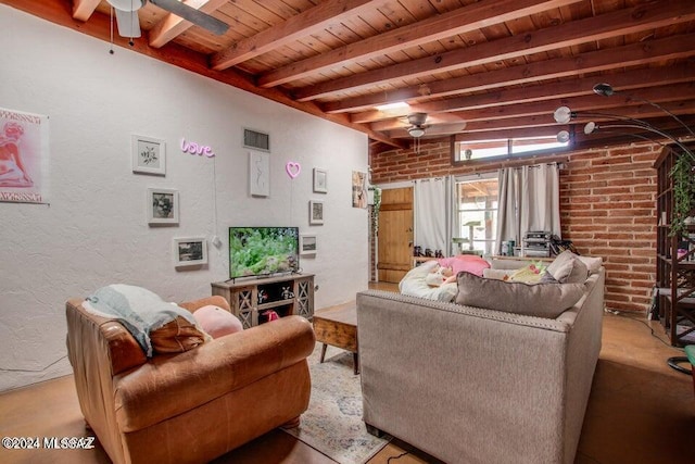 living room featuring beam ceiling, wooden ceiling, brick wall, and ceiling fan