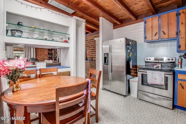 kitchen featuring stainless steel appliances, wood ceiling, beam ceiling, light tile patterned flooring, and brick wall