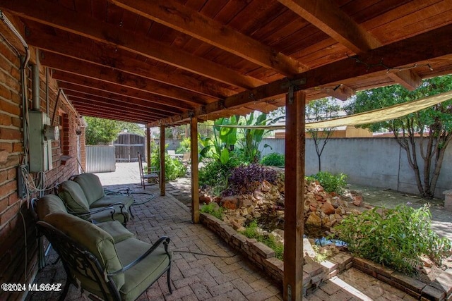 view of patio / terrace featuring a shed