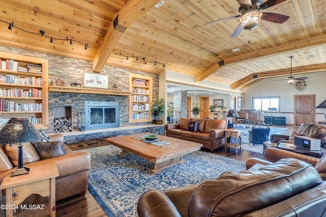 living room featuring built in shelves, hardwood / wood-style flooring, and wooden ceiling