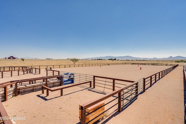 exterior space with a mountain view and a rural view