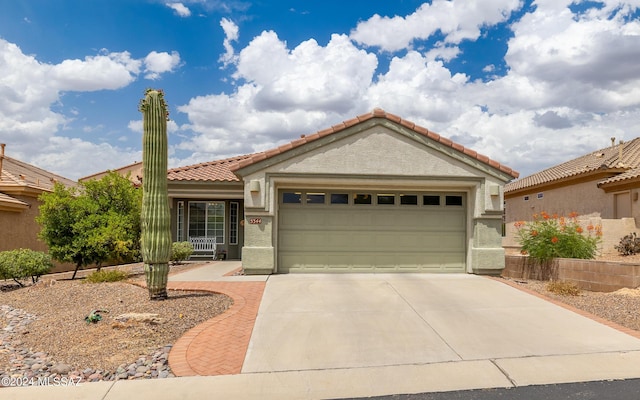 mediterranean / spanish-style house featuring a garage