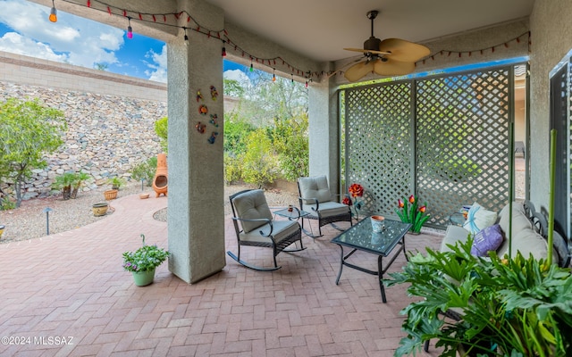 view of patio / terrace featuring ceiling fan