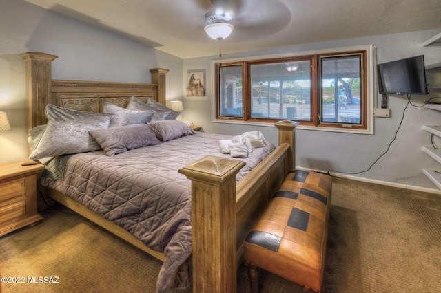 bedroom with ceiling fan and carpet