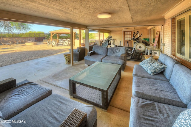 view of patio / terrace with a gazebo and an outdoor hangout area