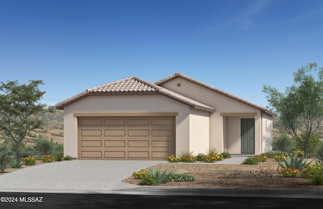 view of front of property with a garage