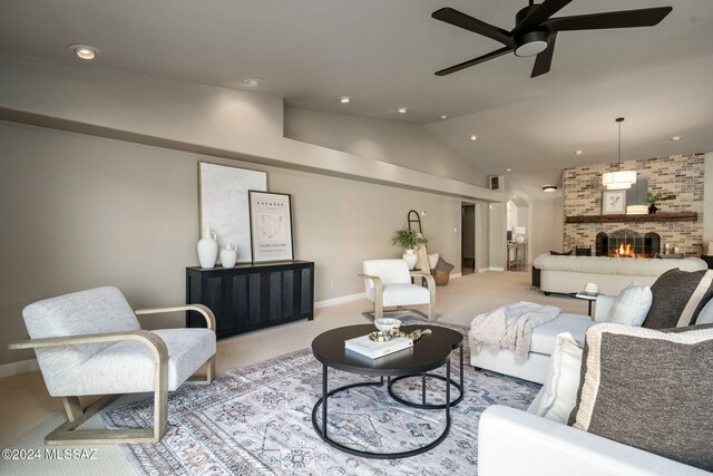 carpeted living room with ceiling fan