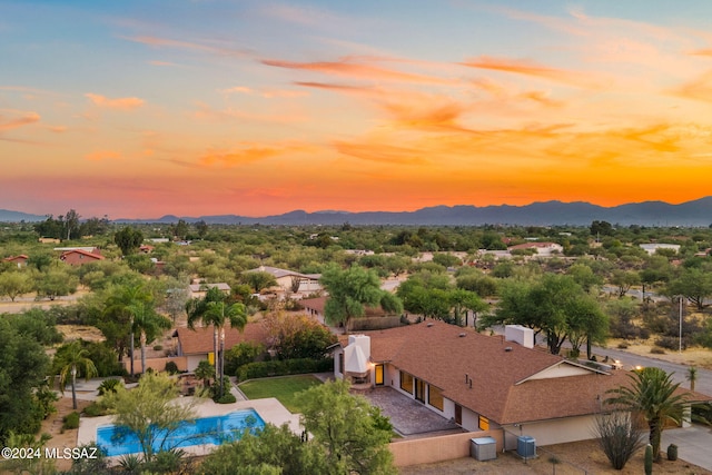 aerial view at dusk with a mountain view