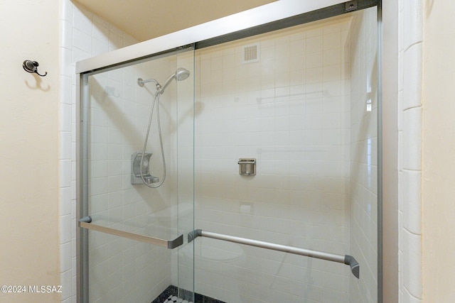 bathroom with a stall shower