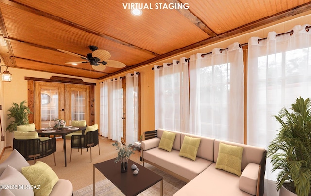 sunroom / solarium with wood ceiling, beamed ceiling, and french doors