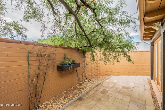 view of patio featuring a fenced backyard