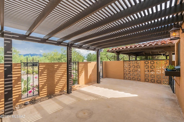 view of patio / terrace with a gate