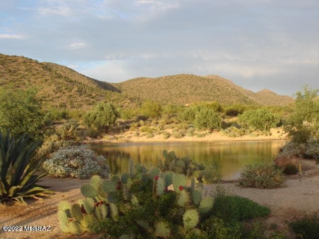 view of mountain feature featuring a water view