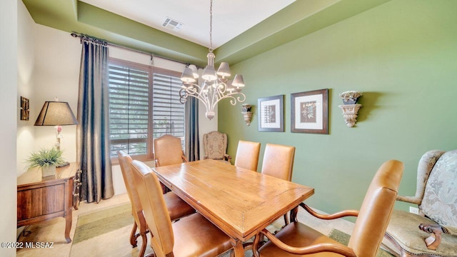 dining room with a chandelier