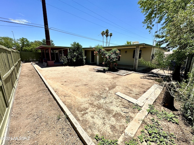 back of house with a patio area