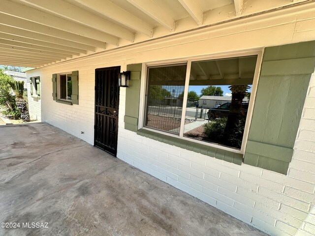 view of front of property with a carport