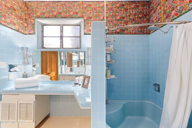 bathroom with shower / bath combo and vanity