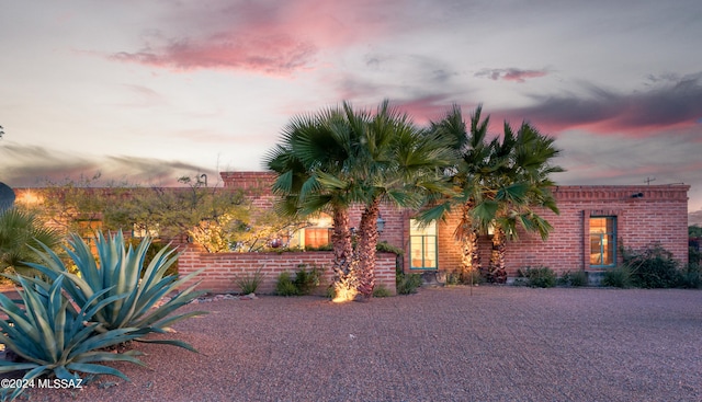 view of property exterior at dusk