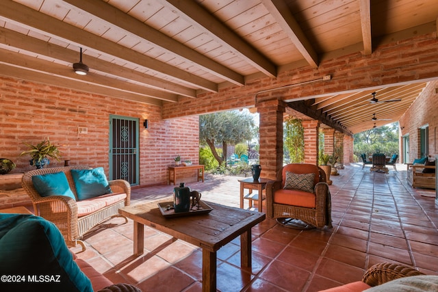 view of patio / terrace with an outdoor hangout area and ceiling fan