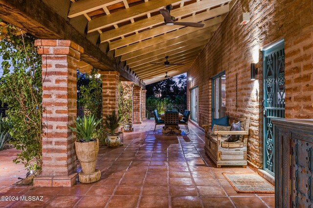 view of patio / terrace featuring ceiling fan