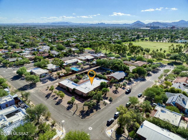 birds eye view of property featuring a mountain view