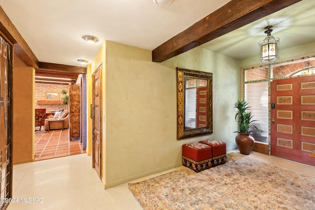 foyer with beam ceiling