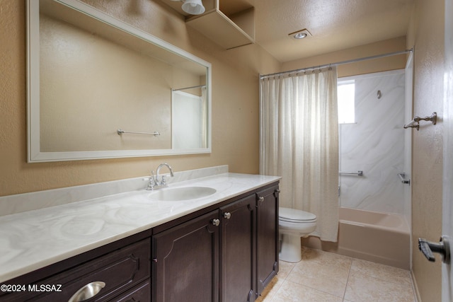 full bathroom featuring tile patterned flooring, vanity, toilet, and shower / bath combo with shower curtain