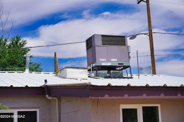 exterior details featuring metal roof