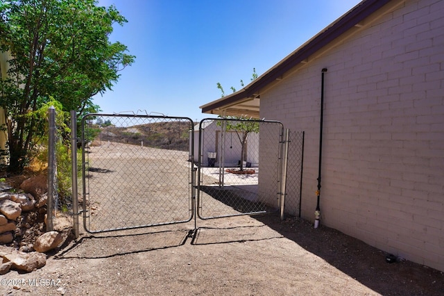 view of yard with a gate and fence