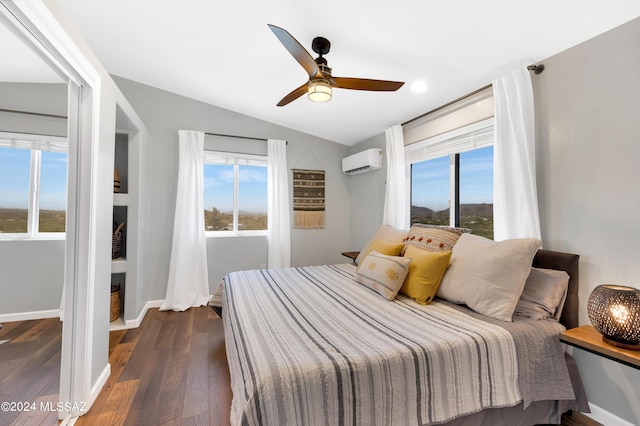 bedroom featuring lofted ceiling, dark hardwood / wood-style flooring, and ceiling fan