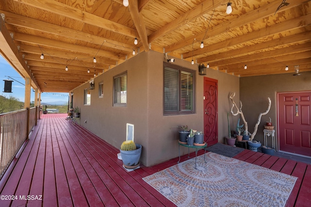 wooden terrace featuring a mountain view