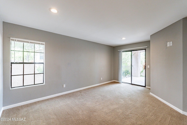 view of carpeted spare room