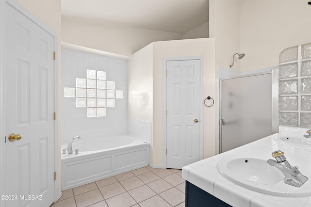 bathroom with vanity, independent shower and bath, and tile patterned flooring