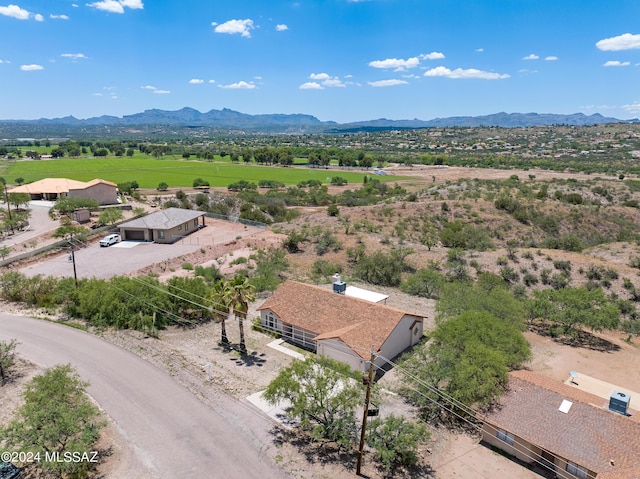 birds eye view of property featuring a mountain view