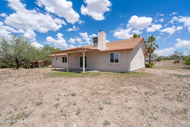 back of property featuring a patio area